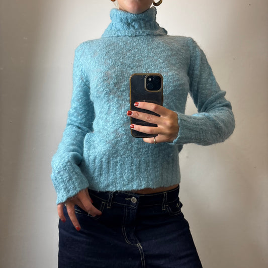 blue knit turtleneck