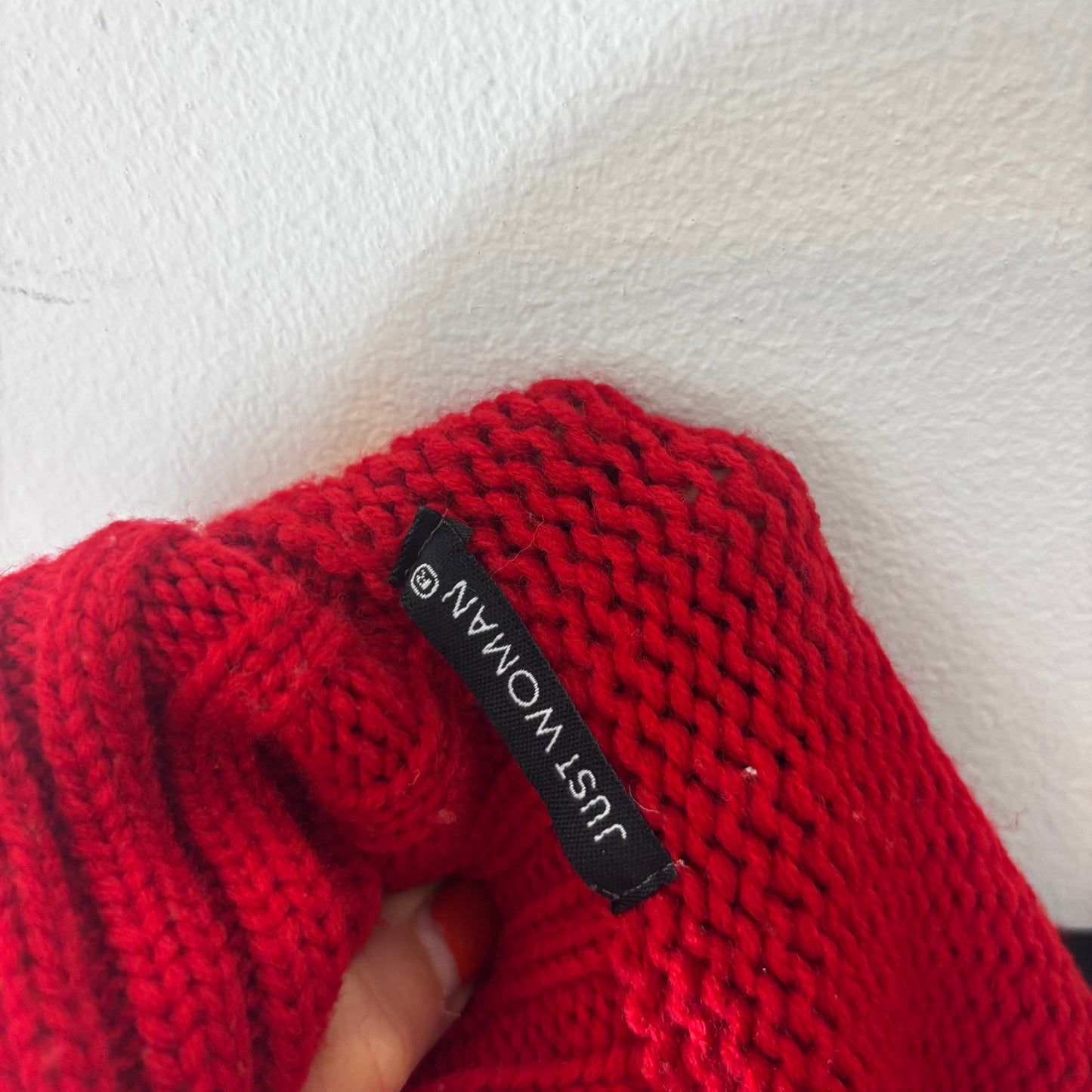 red knit jumper