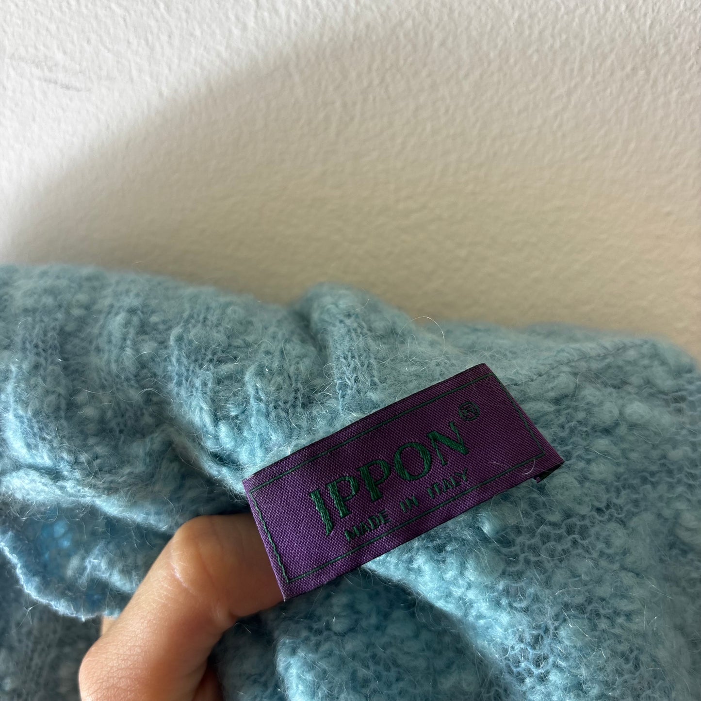 blue knit turtleneck