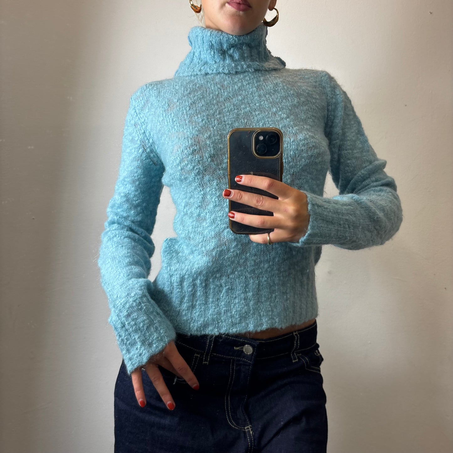 blue knit turtleneck