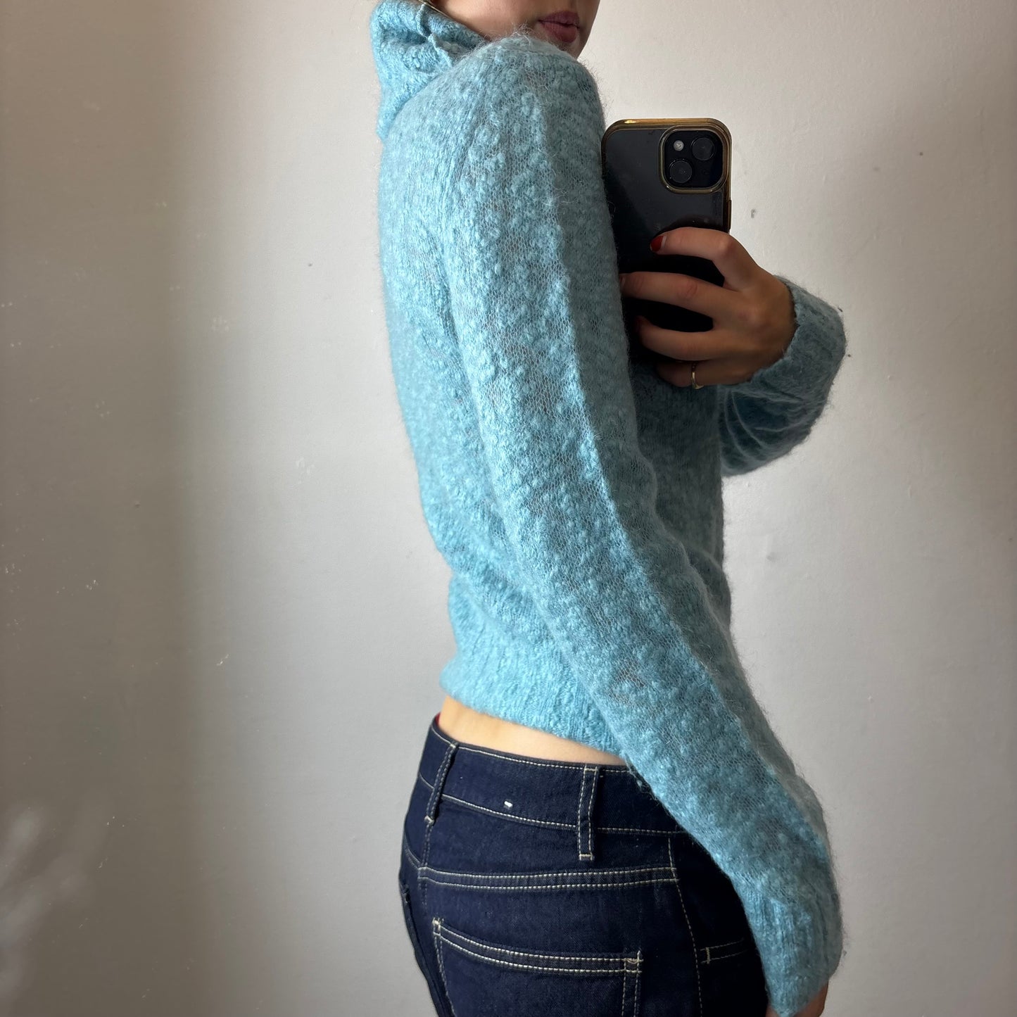 blue knit turtleneck